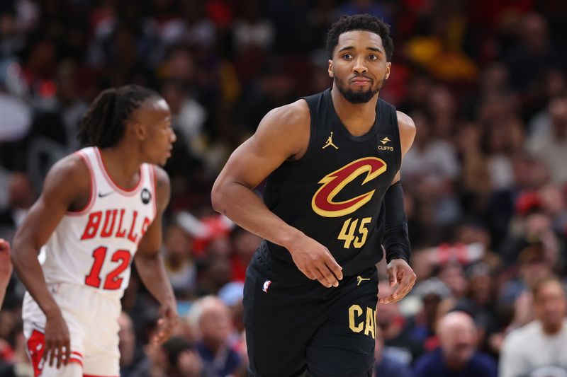 CHICAGO, ILLINOIS - FEBRUARY 28: Donovan Mitchell #45 of the Cleveland Cavaliers celebrates a three pointer against the Chicago Bulls during the second half at the United Center on February 28, 2024 in Chicago, Illinois. NOTE TO USER: User expressly acknowledges and agrees that, by downloading and or using this photograph, User is consenting to the terms and conditions of the Getty Images License Agreement. (Photo by Michael Reaves/Getty Images)