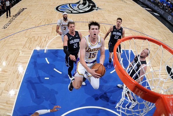 ORLANDO, FL - NOVEMBER 4: Austin Reaves #15 of the Los Angeles Lakers drives to the basket during the game against the Orlando Magic on November 4, 2023 at Amway Center in Orlando, Florida. NOTE TO USER: User expressly acknowledges and agrees that, by downloading and or using this photograph, User is consenting to the terms and conditions of the Getty Images License Agreement. Mandatory Copyright Notice: Copyright 2023 NBAE (Photo by Fernando Medina/NBAE via Getty Images)