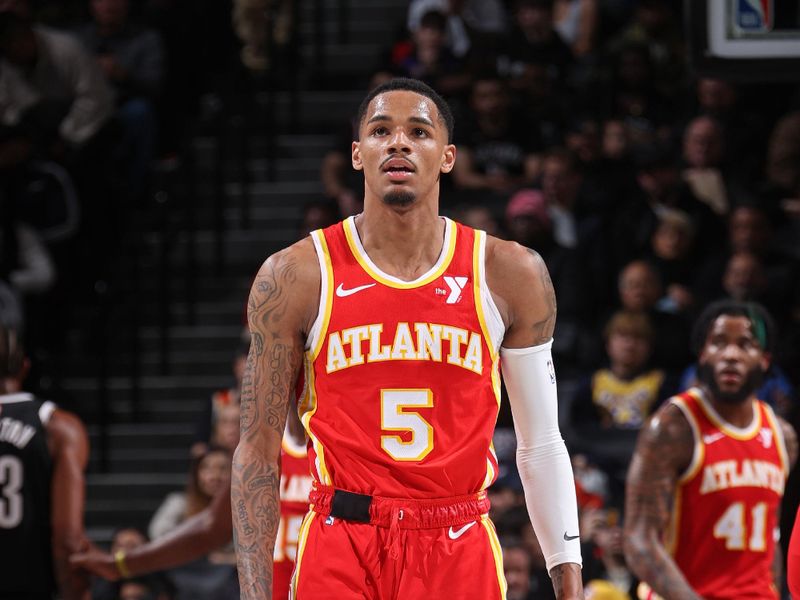 BROOKLYN, NY - MARCH 2: Dejounte Murray #5 of the Atlanta Hawks looks on during the game against the Brooklyn Nets on March 2, 2024 at Barclays Center in Brooklyn, New York. NOTE TO USER: User expressly acknowledges and agrees that, by downloading and or using this Photograph, user is consenting to the terms and conditions of the Getty Images License Agreement. Mandatory Copyright Notice: Copyright 2024 NBAE (Photo by Nathaniel S. Butler/NBAE via Getty Images)