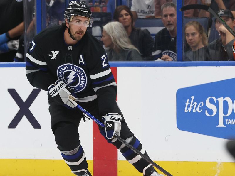 Oct 25, 2025; Tampa, Florida, USA; Tampa Bay Lightning defenseman Ryan McDonagh (27) skates with the puck against the Anaheim Ducks during the first period at Benchmark International Arena. Mandatory Credit: Kim Klement Neitzel-Imagn Images