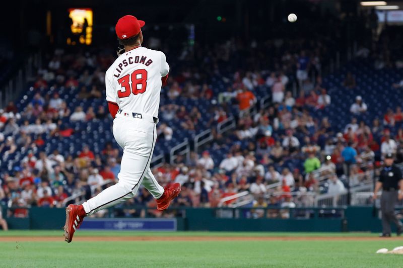 Jul 23, 2024; Washington, District of Columbia, USA; Washington Nationals third baseman Trey Lipscomb (38) makes a throw to first base on a ground ball by San Diego Padres first baseman Luis Arraez (not pictured) during the seventh inning at Nationals Park. Mandatory Credit: Geoff Burke-USA TODAY Sports