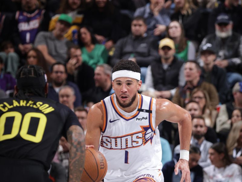 SALT LAKE CITY, UT - NOVEMBER 12: Devin Booker #1 of the Phoenix Suns dribbles the ball during the game against the Utah Jazz during the Emirates NBA Cup game on November 12, 2024 at vivint.SmartHome Arena in Salt Lake City, Utah. NOTE TO USER: User expressly acknowledges and agrees that, by downloading and or using this Photograph, User is consenting to the terms and conditions of the Getty Images License Agreement. Mandatory Copyright Notice: Copyright 2024NBAE (Photo by Melissa Majchrzak/NBAE via Getty Images)