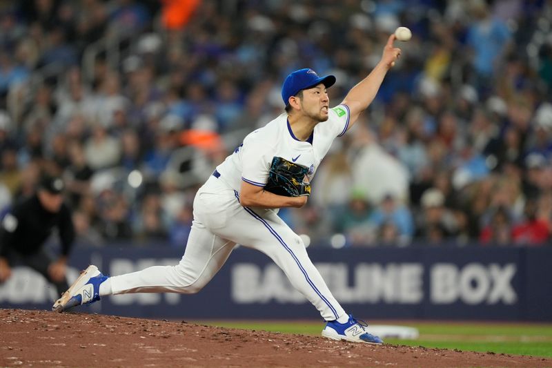 May 10, 2024; Toronto, Ontario, CAN; Toronto Blue Jays starting pitcher Yusei Kikuchi (16) pitches to the Minnesota Twins during the fourth inning at Rogers Centre. Mandatory Credit: John E. Sokolowski-USA TODAY Sports