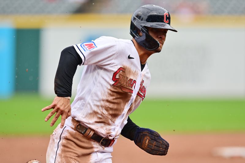 Sep 6, 2023; Cleveland, Ohio, USA; Cleveland Guardians second baseman Andres Gimenez (0) rounds third base en route to scoring during the fourth inning against the Minnesota Twins at Progressive Field. Mandatory Credit: Ken Blaze-USA TODAY Sports