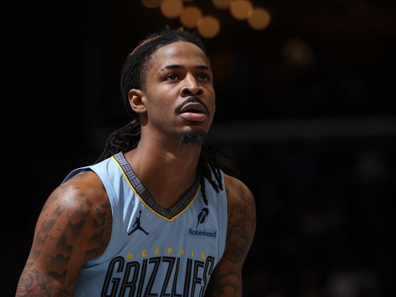 MEMPHIS, TN - NOVEMBER 29: Ja Morant #12 of the Memphis Grizzlies shoots a free throw during the game against the New Orleans Pelicans during the Emirates NBA Cup game on November 29, 2024 at FedExForum in Memphis, Tennessee. NOTE TO USER: User expressly acknowledges and agrees that, by downloading and or using this photograph, User is consenting to the terms and conditions of the Getty Images License Agreement. Mandatory Copyright Notice: Copyright 2024 NBAE (Photo by Joe Murphy/NBAE via Getty Images)