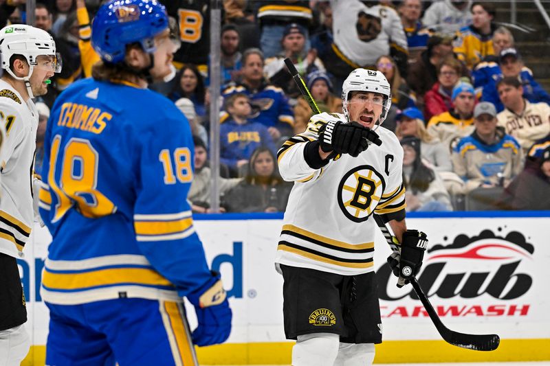 Jan 13, 2024; St. Louis, Missouri, USA;  Boston Bruins left wing Brad Marchand (63) reacts after scoring against the St. Louis Blues during the third period at Enterprise Center. Mandatory Credit: Jeff Curry-USA TODAY Sports