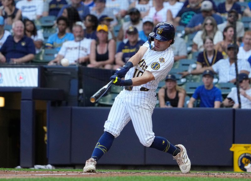 Jun 29, 2025; Milwaukee, Wisconsin, USA; Milwaukee Brewers outfielder Sal Frelick (10) hits a home run against the Colorado Rockies in the sixth inning at American Family Field. Mandatory Credit: Michael McLoone-Imagn Images