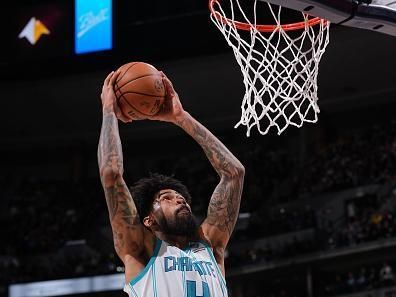 DENVER, CO - JANUARY 1: Nick Richards #4 of the Charlotte Hornets drives to the basket during the game against the Denver Nuggets on January 1, 2024 at the Ball Arena in Denver, Colorado. NOTE TO USER: User expressly acknowledges and agrees that, by downloading and/or using this Photograph, user is consenting to the terms and conditions of the Getty Images License Agreement. Mandatory Copyright Notice: Copyright 2024 NBAE (Photo by Bart Young/NBAE via Getty Images)