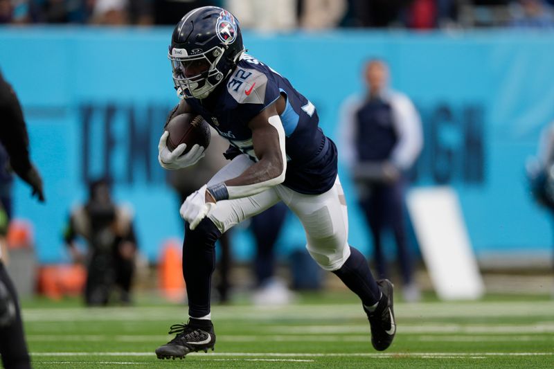 Tennessee Titans running back Tyjae Spears (32) runs the ball during the first half of an NFL football game against the Jacksonville Jaguars, Sunday, Jan. 7, 2024, in Nashville, Tenn. (AP Photo/George Walker IV)