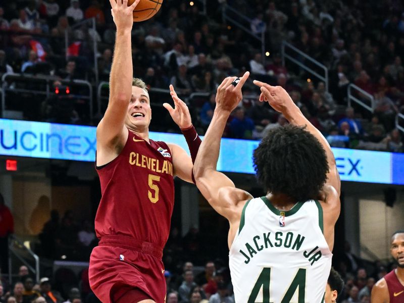 CLEVELAND, OHIO - NOVEMBER 04: Sam Merrill #5 of the Cleveland Cavaliers shoots over Andre Jackson Jr. #44 of the Milwaukee Bucks during the fourth quarter at Rocket Mortgage Fieldhouse on November 04, 2024 in Cleveland, Ohio. The Cavaliers defeated the Bucks 116-114. NOTE TO USER: User expressly acknowledges and agrees that, by downloading and or using this photograph, User is consenting to the terms and conditions of the Getty Images License Agreement. (Photo by Jason Miller/Getty Images)