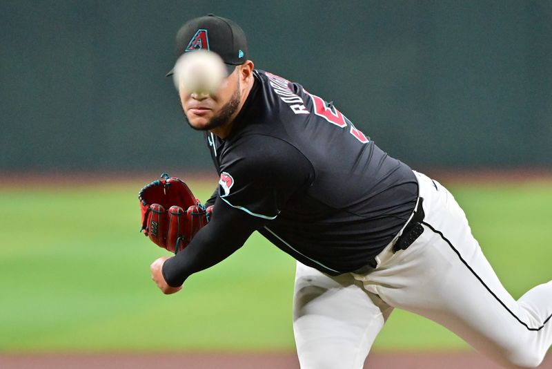 Sep 23, 2024; Phoenix, Arizona, USA;  Arizona Diamondbacks pitcher Eduardo Rodriguez (57) throws in the first inning against the San Francisco Giants at Chase Field. Mandatory Credit: Matt Kartozian-Imagn Images