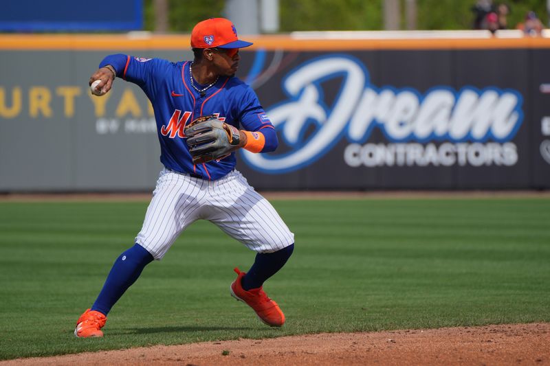 Mar 5, 2024; Port St. Lucie, Florida, USA;  New York Mets shortstop Francisco Lindor (12) throws a runner out at second base in the third inning against the New York Yankees at Clover Park. Mandatory Credit: Jim Rassol-USA TODAY Sports