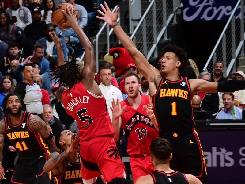 ATLANTA, GA - February 23:   Immanuel Quickley #5 of the Toronto Raptors grabs a rebound during the game against the Atlanta Hawks on February 23, 2024 at State Farm Arena in Atlanta, Georgia.  NOTE TO USER: User expressly acknowledges and agrees that, by downloading and/or using this Photograph, user is consenting to the terms and conditions of the Getty Images License Agreement. Mandatory Copyright Notice: Copyright 2024 NBAE (Photo by Scott Cunningham/NBAE via Getty Images)