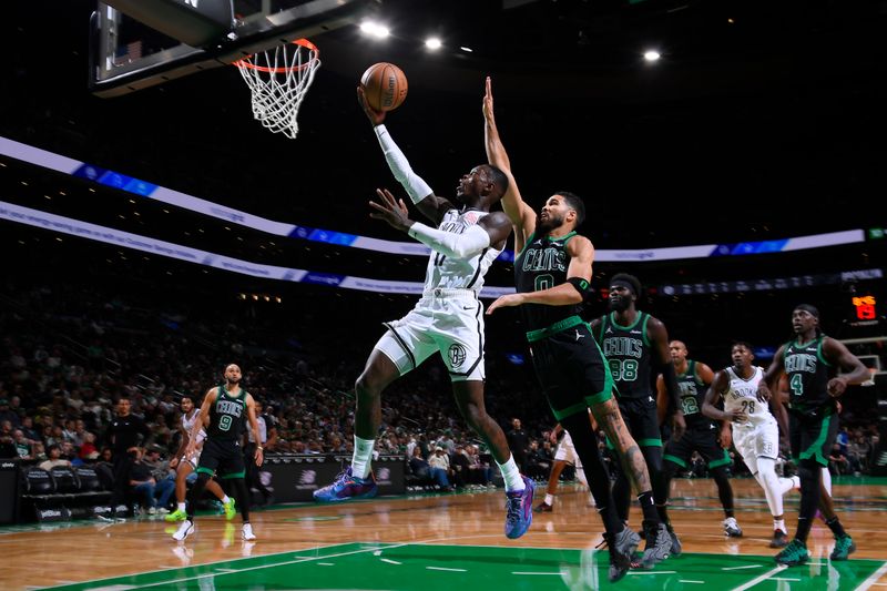 BOSTON, MA - NOVEMBER 8: Dennis Schroder #17 of the Brooklyn Nets drives to the basket during the game against the Boston Celtics on November 8, 2024 at TD Garden in Boston, Massachusetts. NOTE TO USER: User expressly acknowledges and agrees that, by downloading and/or using this Photograph, user is consenting to the terms and conditions of the Getty Images License Agreement. Mandatory Copyright Notice: Copyright 2024 NBAE (Photo by Brian Babineau/NBAE via Getty Images)