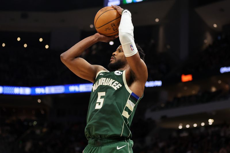 MILWAUKEE, WISCONSIN - APRIL 21: Malik Beasley #5 of the Milwaukee Bucks takes a three point shot against the Indiana Pacers during the second half of game one of the Eastern Conference First Round Playoffs at Fiserv Forum on April 21, 2024 in Milwaukee, Wisconsin.  NOTE TO USER: User expressly acknowledges and agrees that, by downloading and or using this photograph, User is consenting to the terms and conditions of the Getty Images License Agreement. (Photo by Stacy Revere/Getty Images)