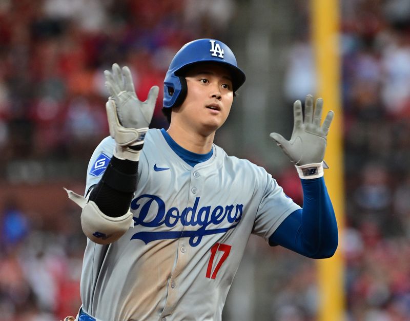 Aug 17, 2024; St. Louis, Missouri, USA;  Los Angeles Dodgers designated hitter Shohei Ohtani (17) celebrates after he hit a solo home run against the St. Louis Cardinals in the fifth inning at Busch Stadium. Mandatory Credit: Tim Vizer-USA TODAY Sports