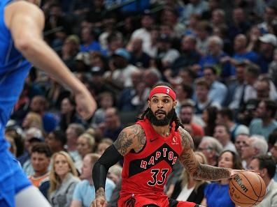 DALLAS, TX - NOVEMBER 8: Gary Trent Jr. #33 of the Toronto Raptors dribbles the ball during the game against the Dallas Mavericks on November 8, 2023 at the American Airlines Center in Dallas, Texas. NOTE TO USER: User expressly acknowledges and agrees that, by downloading and or using this photograph, User is consenting to the terms and conditions of the Getty Images License Agreement. Mandatory Copyright Notice: Copyright 2023 NBAE (Photo by Glenn James/NBAE via Getty Images)