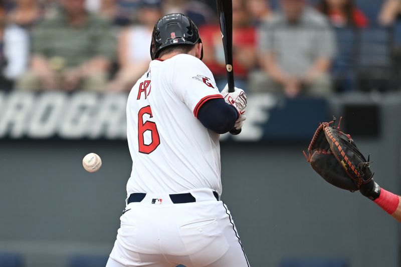Jun 9, 2025; Cleveland, Ohio, USA; Cleveland Guardians designated hitter David Fry (6) is hit by a pitch during the third inning against the Cincinnati Reds at Progressive Field. Mandatory Credit: Ken Blaze-Imagn Images