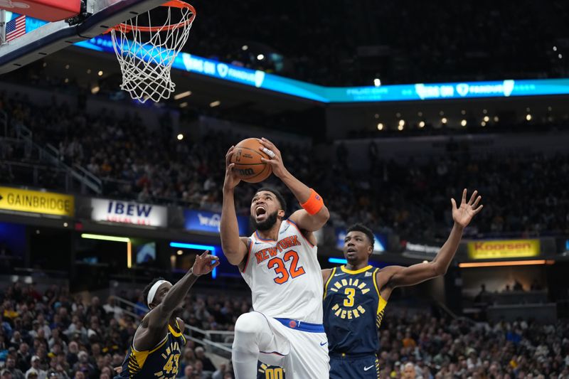 INDIANAPOLIS, IN - FEBRUARY 11: Karl-Anthony Towns #32 of the New York Knicks drives to the basket during the game against the Indiana Pacers on February 11, 2025 at Gainbridge Fieldhouse in Indianapolis, Indiana. NOTE TO USER: User expressly acknowledges and agrees that, by downloading and or using this Photograph, user is consenting to the terms and conditions of the Getty Images License Agreement. Mandatory Copyright Notice: Copyright 2025 NBAE (Photo by A.J. Mast/NBAE via Getty Images)