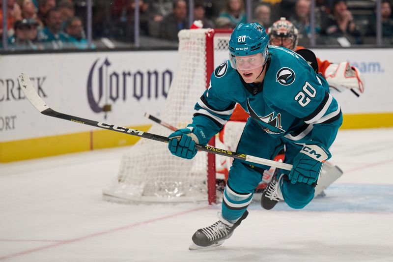 sNov 7, 2023; San Jose, California, USA; San Jose Sharks left wing Fabian Zetterlund (20) skates on the ice against the Philadelphia Flyers during the second period at SAP Center at San Jose. Mandatory Credit: Robert Edwards-USA TODAY Sports