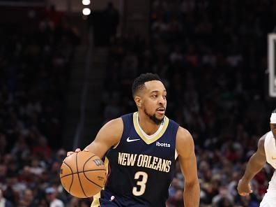 CLEVELAND, OH - DECEMBER 21: CJ McCollum #3 of the New Orleans Pelicans handles the ball during the game against the Cleveland Cavaliers on December 21, 2023 at Rocket Mortgage FieldHouse in Cleveland, Ohio. NOTE TO USER: User expressly acknowledges and agrees that, by downloading and/or using this Photograph, user is consenting to the terms and conditions of the Getty Images License Agreement. Mandatory Copyright Notice: Copyright 2023 NBAE (Photo by  Lauren Leigh Bacho/NBAE via Getty Images)