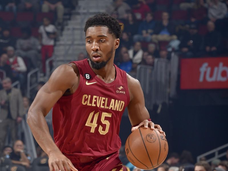 CLEVELAND, OH - NOVEMBER 18: Donovan Mitchell #45 of the Cleveland Cavaliers dribbles the ball during the game against the Charlotte Hornets on November 18, 2022 at Rocket Mortgage FieldHouse in Cleveland, Ohio. NOTE TO USER: User expressly acknowledges and agrees that, by downloading and/or using this Photograph, user is consenting to the terms and conditions of the Getty Images License Agreement. Mandatory Copyright Notice: Copyright 2022 NBAE (Photo by David Liam Kyle/NBAE via Getty Images)