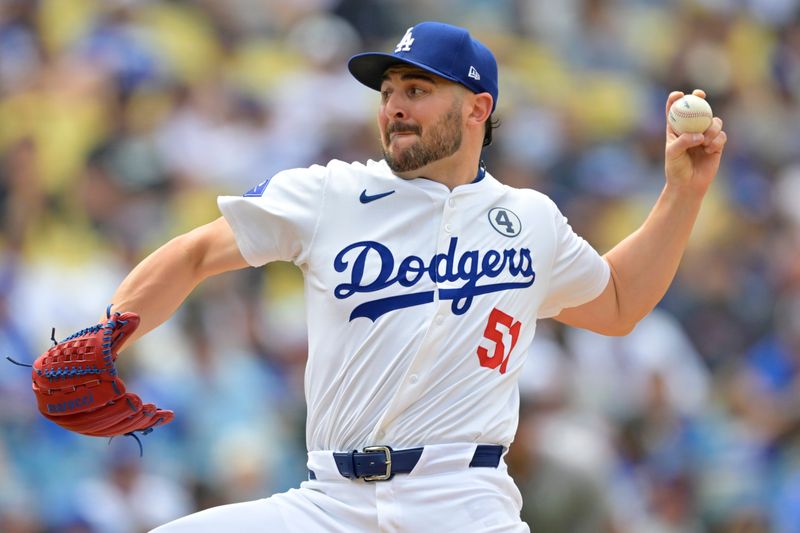 Jun 2, 2024; Los Angeles, California, USA;  Los Angeles Dodgers pitcher Alex Vesia (51) delivers to the plate in the eighth inning against the Colorado Rockies at Dodger Stadium. Credit: Jayne Kamin-Oncea-USA TODAY Sports