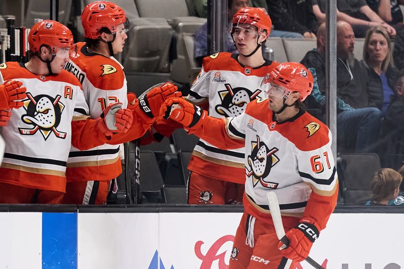 Oct 1, 2025; San Jose, California, USA; Anaheim Ducks left wing Cutter Gauthier (61) shakes hands with his teammates after scoring a goal against San Jose Sharks goaltender Yaroslav Askarov (30) (not pictured) during the second period at SAP Center at San Jose. Mandatory Credit: Robert Edwards-Imagn Images