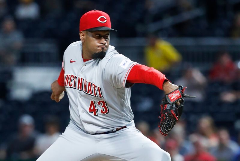 Aug 13, 2023; Pittsburgh, PA, USA; Cincinnati Reds relief pitcher Alexis Diaz (43) pitches against the Pittsburgh Pirates during the ninth inning at PNC Park. The Reds won 6-5 in ten innings. Mandatory Credit: Charles LeClaire-USA TODAY Sports