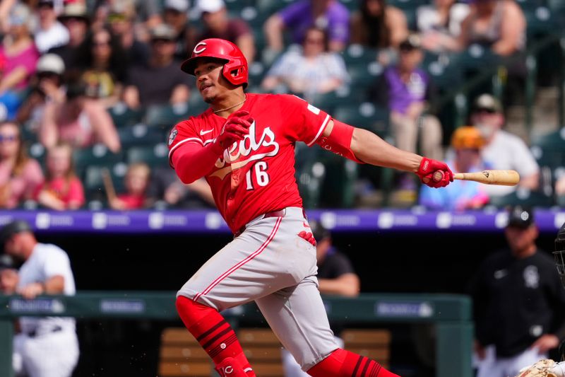 Apr 27, 2025; Denver, Colorado, USA; Cincinnati Reds third baseman Noelvi Marte (16) hits a RBI single in the ninth inning against the Colorado Rockies at Coors Field. Mandatory Credit: Ron Chenoy-Imagn Images