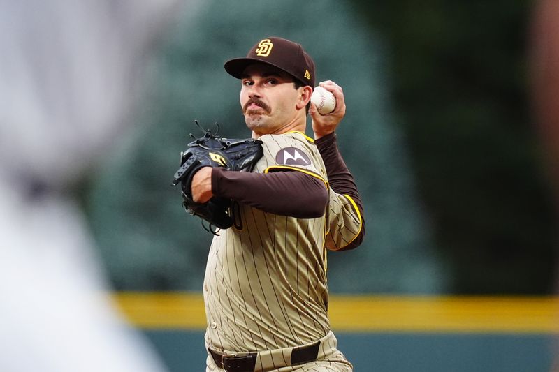 Aug 17, 2024; Denver, Colorado, USA; San Diego Padres starting pitcher Dylan Cease (84) delivers a pitch in the first inning against the Colorado Rockies at Coors Field. Mandatory Credit: Ron Chenoy-USA TODAY Sports