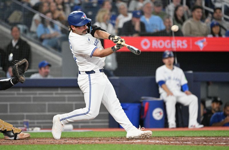 May 17, 2024; Toronto, Ontario, CAN;  Toronto Blue Jays left fielder Davis Schneider (36) hits a two run home run against the Tampa Bay Rays in the eighth inning at Rogers Centre. Mandatory Credit: Dan Hamilton-USA TODAY Sports