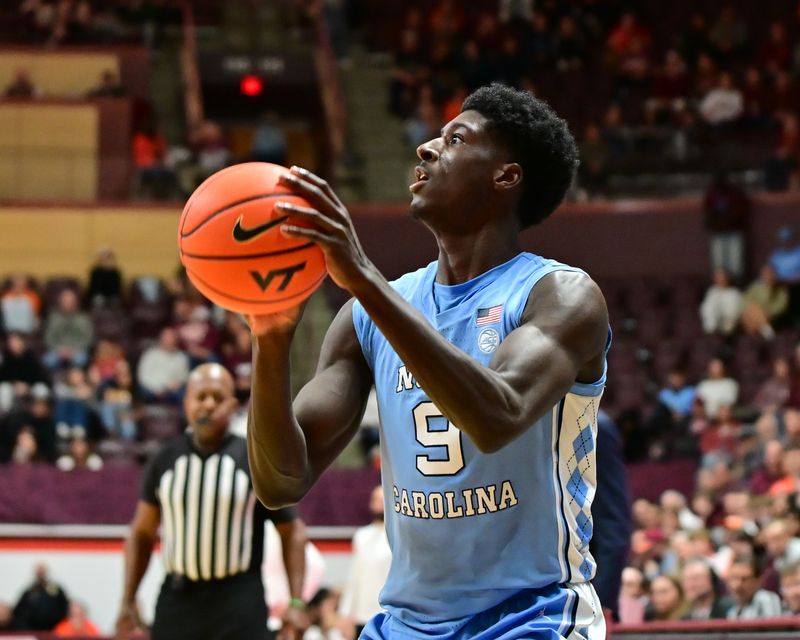 Mar 4, 2025; Blacksburg, Virginia, USA;  North Carolina Tar Heels guard Drake Powell (9) shoots the ball during the second half at Cassell Coliseum. Mandatory Credit: Brian Bishop-Imagn Images