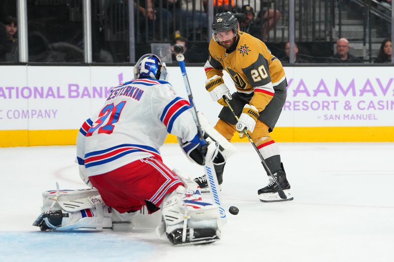 Nov 18, 2025; Las Vegas, Nevada, USA; Vegas Golden Knights left wing Brandon Saad (20) shoots against New York Rangers goaltender Igor Shesterkin (31) during the first period at T-Mobile Arena. Mandatory Credit: Stephen R. Sylvanie-Imagn Images