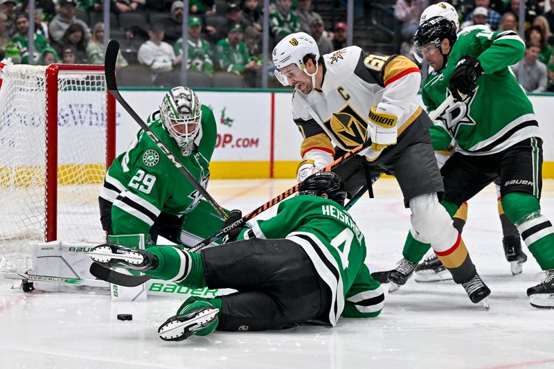 Dec 9, 2023; Dallas, Texas, USA; Vegas Golden Knights right wing Mark Stone (61) and Dallas Stars goaltender Jake Oettinger (29) and defenseman Miro Heiskanen (4) battle for control of the loose puck in the Stars zone during the third period at the American Airlines Center. Mandatory Credit: Jerome Miron-USA TODAY Sports