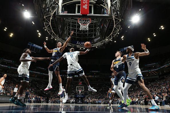 MINNEAPOLIS, MN -  NOVEMBER 1: Naz Reid #11 of the Minnesota Timberwolves grabs a rebound during the game against the Denver Nuggets on November 1, 2023 at Target Center in Minneapolis, Minnesota. NOTE TO USER: User expressly acknowledges and agrees that, by downloading and or using this Photograph, user is consenting to the terms and conditions of the Getty Images License Agreement. Mandatory Copyright Notice: Copyright 2023 NBAE (Photo by David Sherman/NBAE via Getty Images)