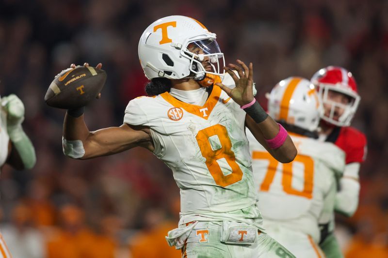 Nov 16, 2024; Athens, Georgia, USA; Tennessee Volunteers quarterback Nico Iamaleava (8) throws a pass against the Georgia Bulldogs in the fourth quarter at Sanford Stadium. Mandatory Credit: Brett Davis-Imagn Images