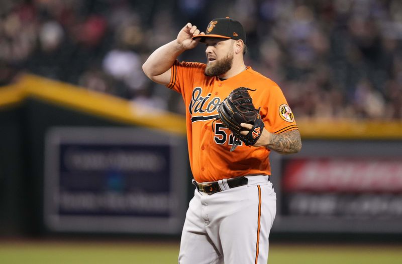 Sep 2, 2023; Phoenix, Arizona, USA; Baltimore Orioles relief pitcher Joey Krehbiel (52) against the Arizona Diamondbacks at Chase Field. Mandatory Credit: Joe Camporeale-USA TODAY Sports