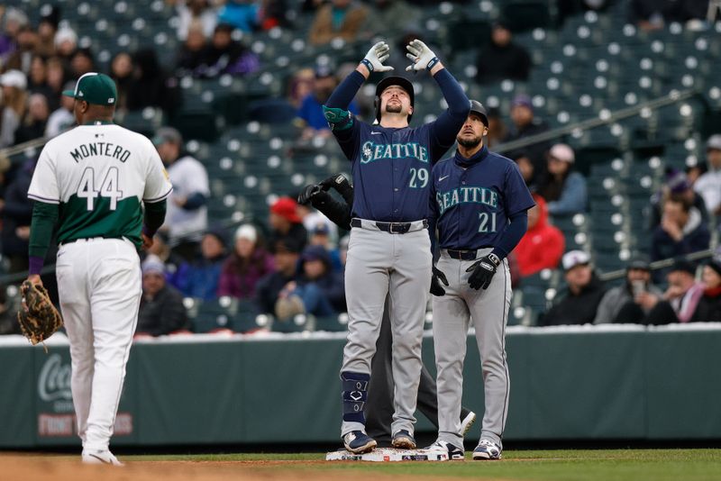 Apr 20, 2024; Denver, Colorado, USA; Seattle Mariners catcher Cal Raleigh (29) reacts from first on an RBI single in the third inning against the Colorado Rockies at Coors Field. Mandatory Credit: Isaiah J. Downing-USA TODAY Sports