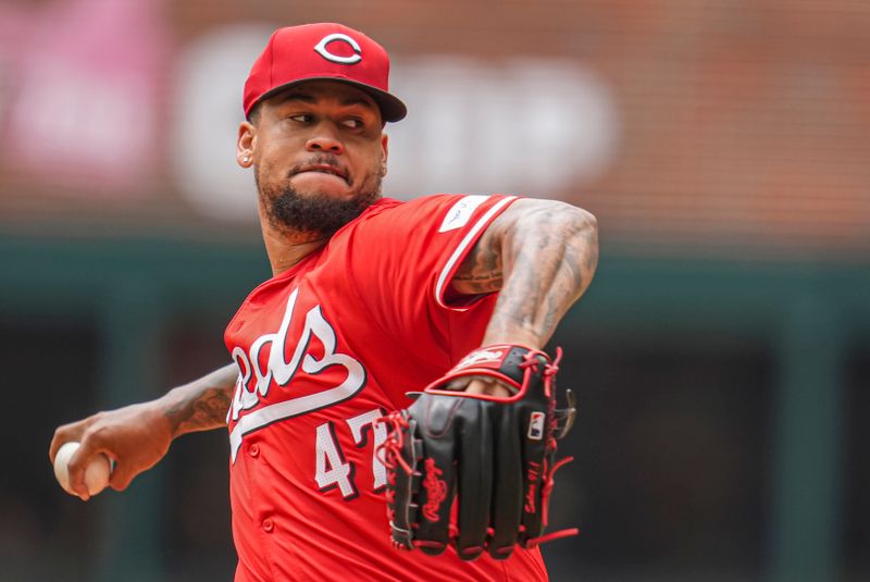 Jul 24, 2024; Cumberland, Georgia, USA; Cincinnati Reds starting pitcher Frankie Montas (47) pitches against the Atlanta Braves during the first inning at Truist Park. Mandatory Credit: Dale Zanine-USA TODAY Sports