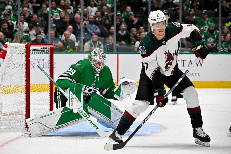 Nov 14, 2023; Dallas, Texas, USA; Arizona Coyotes center Nick Bjugstad (17) screens Dallas Stars goaltender Jake Oettinger (29) during the third period at the American Airlines Center. Mandatory Credit: Jerome Miron-USA TODAY Sports