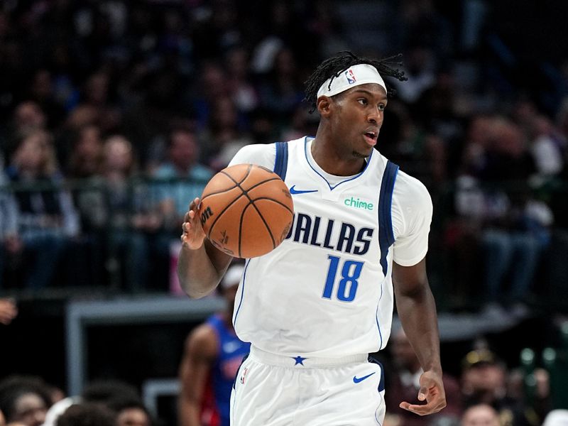 DALLAS, TX - OCTOBER 20: Olivier Maxence-Prosper #18 of the Dallas Mavericks dribbles the ball during the game against the Detroit Pistons on October 20, 2023 at the American Airlines Center in Dallas, Texas. NOTE TO USER: User expressly acknowledges and agrees that, by downloading and or using this photograph, User is consenting to the terms and conditions of the Getty Images License Agreement. Mandatory Copyright Notice: Copyright 2023 NBAE (Photo by Glenn James/NBAE via Getty Images)