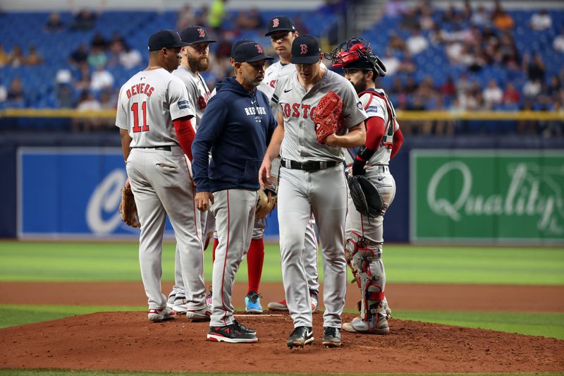 Sep 17, 2024; St. Petersburg, Florida, USA;  Boston Red Sox manager Alex Cora (13) comes to the mound to take out pitcher Nick Pivetta (37) during the fifth inning against the Tampa Bay Rays at Tropicana Field. Mandatory Credit: Kim Klement Neitzel-Imagn Images