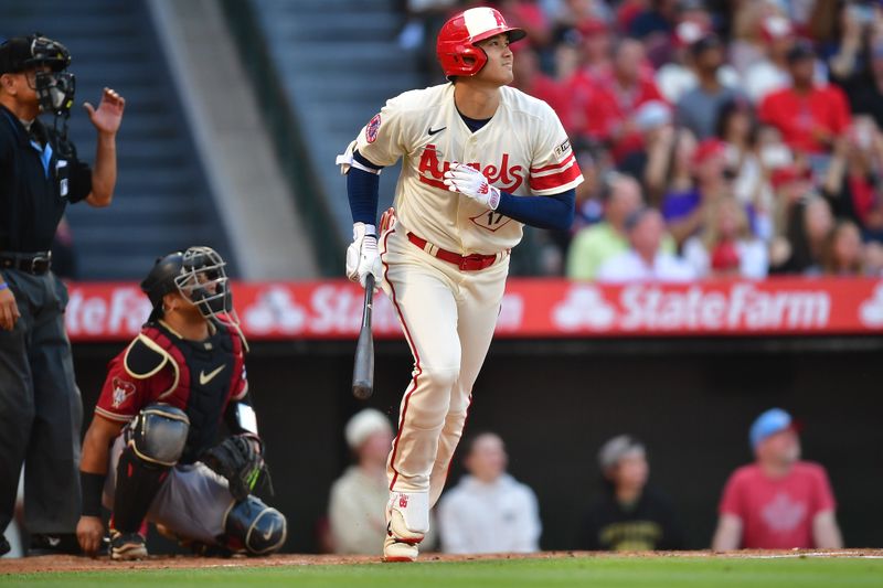 Jul 1, 2023; Anaheim, California, USA; Los Angeles Angels designated hitter Shohei Ohtani (17) runs out a fly ball against the Arizona Diamondbacks during the first inning at Angel Stadium. Mandatory Credit: Gary A. Vasquez-USA TODAY Sports