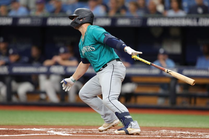 Sep 9, 2023; St. Petersburg, Florida, USA;  Seattle Mariners first baseman Ty France (23) hits a two rbi single against the Tampa Bay Rays in the first inning at Tropicana Field. Mandatory Credit: Nathan Ray Seebeck-USA TODAY Sports