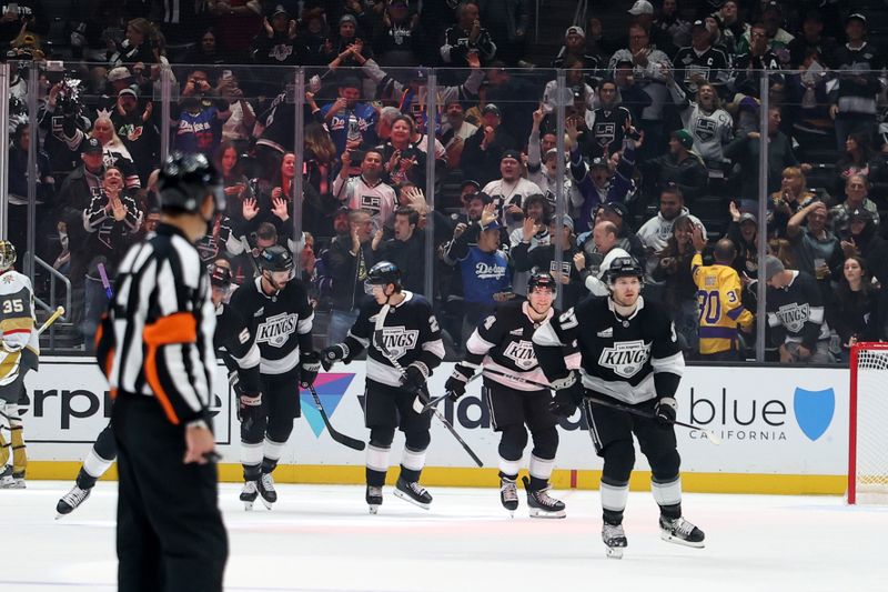 Oct 30, 2024; Los Angeles, California, USA;  Los Angeles Kings left wing Warren Foegele (37) reacts after scoring a goal during the first period against the Vegas Golden Knights at Crypto.com Arena. Mandatory Credit: Kiyoshi Mio-Imagn Images