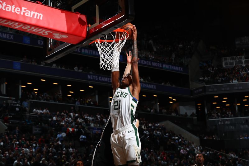 BROOKLYN, NY - OCTOBER 27: Tyler Smith #21 of the Milwaukee Bucks dunks the ball during the game against the Brooklyn Nets on October 27, 2024 at Barclays Center in Brooklyn, New York. NOTE TO USER: User expressly acknowledges and agrees that, by downloading and or using this Photograph, user is consenting to the terms and conditions of the Getty Images License Agreement. Mandatory Copyright Notice: Copyright 2024 NBAE (Photo by David L. Nemec/NBAE via Getty Images)