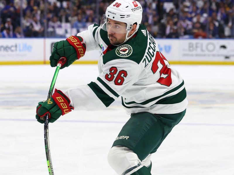 Nov 10, 2023; Buffalo, New York, USA;  Minnesota Wild right wing Mats Zuccarello (36) takes a shot on goal during the first period against the Buffalo Sabres at KeyBank Center. Mandatory Credit: Timothy T. Ludwig-USA TODAY Sports