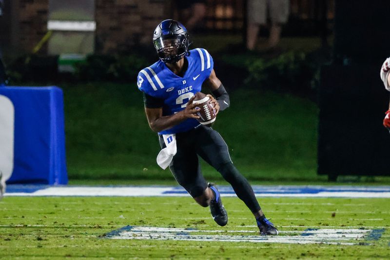 Oct 14, 2023; Durham, North Carolina, USADuke Blue Devils quarterback Henry Belin IV (3) prepares to throw the ball during the second half of the game against North Carolina State Wolfpack at Wallace Wade Stadium. Mandatory Credit: Jaylynn Nash-USA TODAY Sports