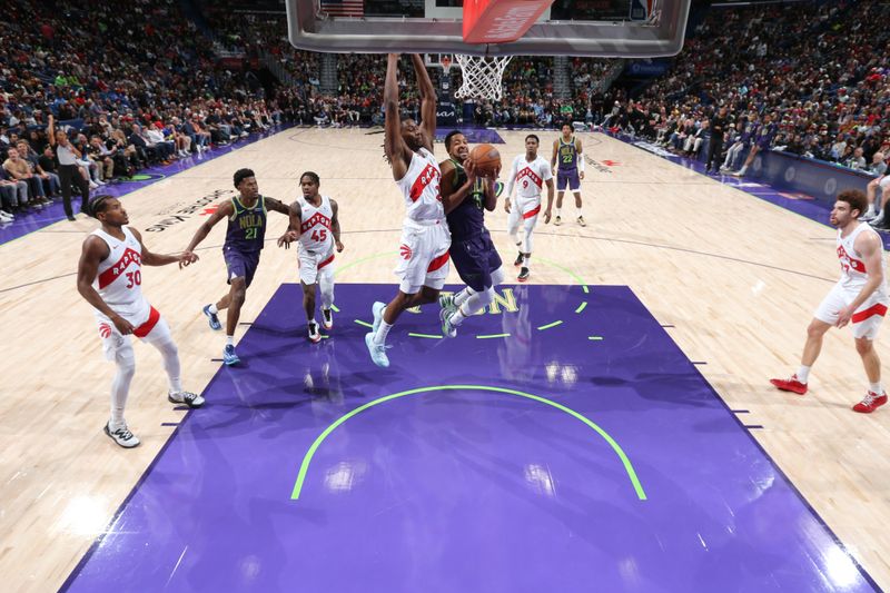 NEW ORLEANS, LA - NOVEMBER 27: CJ McCollum #3 of the New Orleans Pelicans shoots the ball during the game against the Toronto Raptors  during a regular season game on November 27, 2024 at the Smoothie King Center in New Orleans, Louisiana. NOTE TO USER: User expressly acknowledges and agrees that, by downloading and or using this Photograph, user is consenting to the terms and conditions of the Getty Images License Agreement. Mandatory Copyright Notice: Copyright 2024 NBAE (Photo by Layne Murdoch Jr./NBAE via Getty Images)